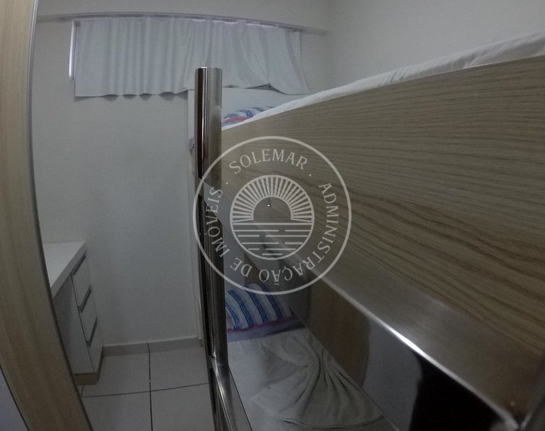 Apartamento com 1 suite e 1 quarto menor com camas beliche